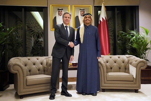 U.S. Secretary of State Antony Blinken shakes hands with Qatar's Prime Minister and Foreign Affairs Minister Mohammed Bin Abdulrahman Al Thani, at Diwan Annex, in Doha, Qatar, on February 6, 2024.
Mandatory Credit:	Mark Schiefelbein/Pool via Reuters