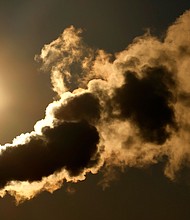 Emissions from a smoke stack at the Essex County Resource Recovery Waste-to-Energy Facility in Newark, New Jersey, on January 21.
Mandatory Credit:	Gary Hershorn/Corbis News/Getty Images