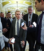Sen. James Lankford talks to reporters as he makes his way to a meeting at the US Capitol on February 5, in Washington, DC.
Mandatory Credit:	Kevin Dietsch/Getty Images