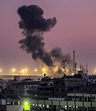 Smoke billows during Israeli bombardment in Rafah on the southern Gaza Strip on Tuesday amid ongoing battles between Israel and the Palestinian militant group Hamas.
Mandatory Credit:	Mahmud Hams/AFP/Getty Images