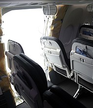 In this National Transportation Safety Board (NTSB) handout, an opening is seen in the fuselage of Alaska Airlines Flight 1282 Boeing 737-9 MAX on January 7, 2024 in Portland, Oregon. A door-sized section near the rear of the Boeing 737-9 MAX plane blew off 10 minutes after Alaska Airlines Flight 1282 took off from Portland, Oregon on January 5 on its way to Ontario, California.
Mandatory Credit:	Handout/NTSB/Getty Images