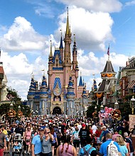 Crowds fill Main Street USA in front of Cinderella Castle at the Magic Kingdom in Lake Buena Vista, Florida, in 2021.
Mandatory Credit:	Joe Burbank/Orlando Sentinel/Tribune News Service/Getty Images