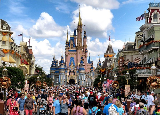 Crowds fill Main Street USA in front of Cinderella Castle at the Magic Kingdom in Lake Buena Vista, Florida, in 2021.
Mandatory Credit:	Joe Burbank/Orlando Sentinel/Tribune News Service/Getty Images
