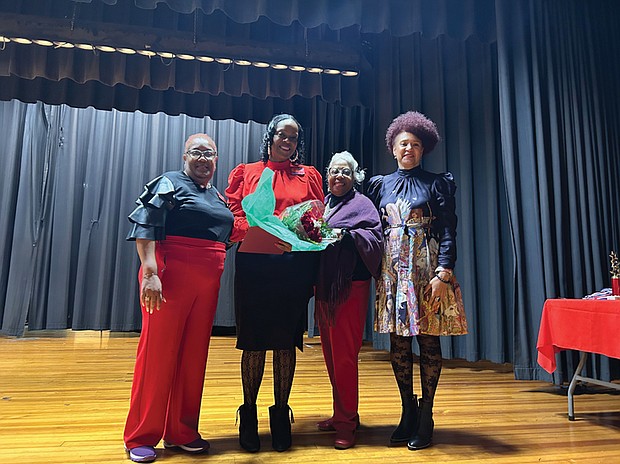 Joining Ms. Pollard onstage were Antoinette Rogers, co-chairperson of the chapter’s Arts and Letters Committee, Dionne Ward, former principal at Brookland Middle School, and RPS School Board Chair Stephanie Rizzi.