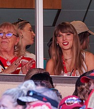 Taylor Swift reacts while sitting next to Donna Kelce watching the Kansas City Chiefs vs Chicago Bears in September 2023.
Mandatory Credit:	Denny Medley-USA Today Sports/Reuters