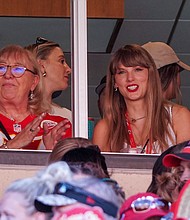 Taylor Swift reacts while sitting next to Donna Kelce watching the Kansas City Chiefs vs Chicago Bears in September 2023.
Mandatory Credit:	Denny Medley-USA Today Sports/Reuters