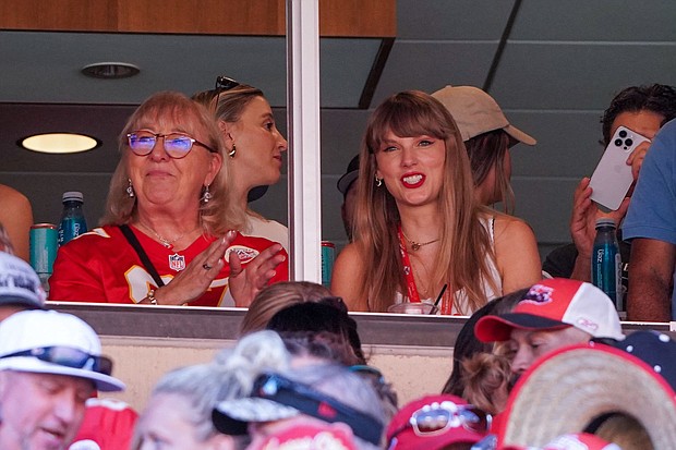 Taylor Swift reacts while sitting next to Donna Kelce watching the Kansas City Chiefs vs Chicago Bears in September 2023.
Mandatory Credit:	Denny Medley-USA Today Sports/Reuters
