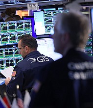 Traders work on the floor of the New York Stock Exchange
Mandatory Credit:	Michael M. Santiago/Getty Images