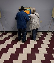 People vote on Election Day at the Jeffersonville Masonic Lodge in Jeffersonville, Ohio, on November 7, 2023.
Mandatory Credit:	Carolyn Kaster/AP/File
