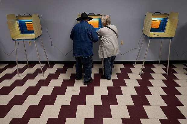 People vote on Election Day at the Jeffersonville Masonic Lodge in Jeffersonville, Ohio, on November 7, 2023.
Mandatory Credit:	Carolyn Kaster/AP/File