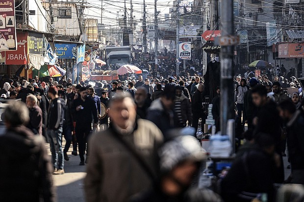 A crowded street in Rafah, where many displaced Palestinians have trekked as the IDF's ground campaign moved south through Gaza.
Mandatory Credit:	Mahmud Hams/AFP/Getty Images