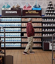 A shopper browses candy at Hershey's Chocolate World in Hershey, Pennsylvania, in November 2021.
Mandatory Credit:	Luke Sharrett/Bloomberg/Getty Images