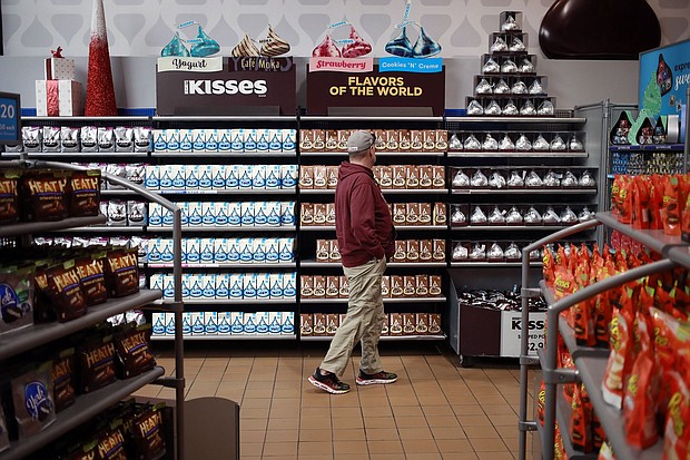 A shopper browses candy at Hershey's Chocolate World in Hershey, Pennsylvania, in November 2021.
Mandatory Credit:	Luke Sharrett/Bloomberg/Getty Images
