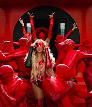 Beyoncé in a Super Bowl ad for Verizon.
Mandatory Credit:	Verizon/Twitter (X)