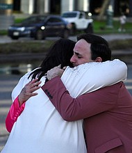 Carlos Gonzalez, a worship singer, hugs a fellow churchgoer after a shooting at Joel Osteen's Lakewood Church in Houston.
Mandatory Credit:	Callaghan O'Hare/Reuters