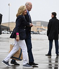 US President Joe Biden and First Lady Jill Biden walk to board Air Force One at Joint Base Andrews in Maryland on December 2023.
Mandatory Credit:	Mandel Ngan/AFP/Getty Images