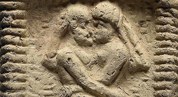 A clay model from Mesopotamia dating to 1800 BC shows a nude couple intertwined on a bed, engaged in sex and kissing.
Mandatory Credit:	The Trustees of the British Museum