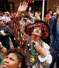 People shout for beads on Bourbon Street on Mardi Gras day back in 2007. The celebration took on even more meaning for New Orleans after Hurricane Katrina.
Mandatory Credit:	Chris Graythen/Getty Images