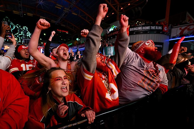 Kansas City Chiefs fans celebrate as their team defeats the San Francisco 49ers in Super Bowl LVIII during the Red Kingdom Block Party at the Power and Light District on February 11, in Kansas City, Missouri.
Mandatory Credit:	Reed Hoffmann/Getty Images