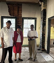 Rev. George Magazine, Prince Wallace and James Marrow stand in the abandoned Mt. Zion School in Charles City County. They are members of the Historic Mt. Zion School Foundation of Charles City that is seeking to restore and preserve the school.