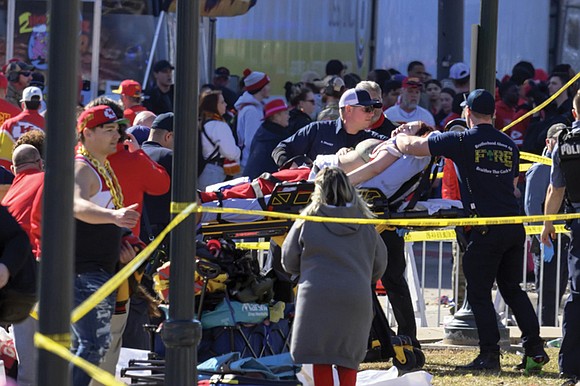 Eight children were among 22 people hit by gunfire in a shooting at the end of Wednesday’s parade to celebrate ...