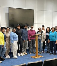 Pat Jones, seventh from right, is the metro Richmond president of Spelman’s alumni chapter, was photographed with other chapter member after Mr. Carter’s presentation.