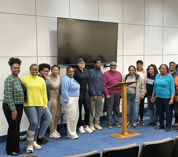Pat Jones, seventh from right, is the metro Richmond president of Spelman’s alumni chapter, was photographed with other chapter member after Mr. Carter’s presentation.