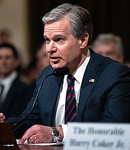 FBI Director Christopher Wray testifies during a Congressional full committee hearing in Washington, DC, on January 31, 2024.
Mandatory Credit:	Julia Nikhinson/AFP/Getty Images