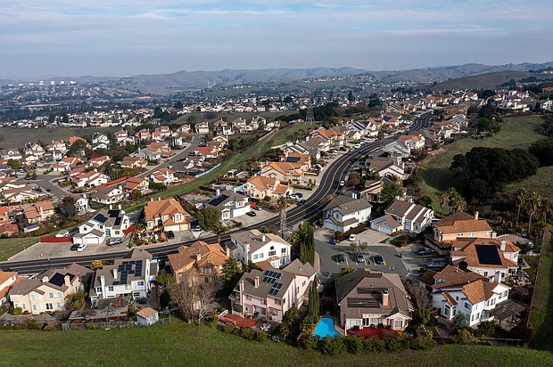 Homes in Pinole, California, on December 26, 2023.
Mandatory Credit:	David Paul Morris/Bloomberg/Getty Images