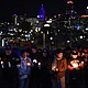 People attend a candlelight vigil at Skywalk Memorial Plaza in Kansas City, Missouri, on Thursday.
Mandatory Credit:	Emmalee Reed/CNN