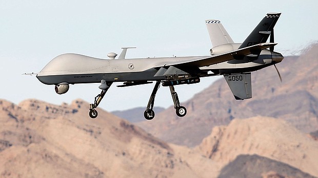 In this 2015 file photo, an MQ-9 Reaper remotely piloted aircraft flies by during a training mission at Creech Air Force Base in Indian Springs, Nevada.
Mandatory Credit:	Isaac Brekken/Getty Images/File