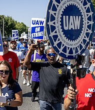 Striking United Auto Workers union march in front of the Stellantis Mopar facility on September 26, 2023 in Ontario, California.
Mandatory Credit:	Gina Ferazzi/Los Angeles Times/Getty Images via CNN Newsource