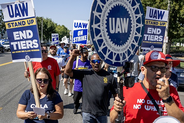 Striking United Auto Workers union march in front of the Stellantis Mopar facility on September 26, 2023 in Ontario, California.
Mandatory Credit:	Gina Ferazzi/Los Angeles Times/Getty Images via CNN Newsource
