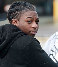 Darryl George, an 18-year-old high school junior, stands outside a courthouse in Anahuac, Texas, on Wednesday, Jan. 24, 2024.
Mandatory Credit:	Lekan Oyekanmi/AP via CNN Newsource