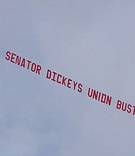 Some Iowa teamsters descended on the Iowa Statehouse, pushing back against a bill they say weakens Iowa unions by using a plane flying around the Capitol reading "Kill Senator Dickey's Union Busting Bill."
Mandatory Credit:	KCCI via CNN Newsource