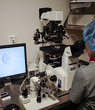 An embryologist is seen at work at the Virginia Center for Reproductive Medicine, in Reston, Virginia on June 12, 2019.
Mandatory Credit:	Ivan Couronne/AFP/Getty Images via CNN Newsource
