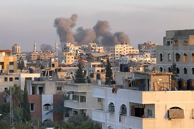 A picture taken in Gaza City shows smoke billowing in the background during Israeli bombardment on February 20, 2024, amid continuing battles between Israel and the Palestinian militant group Hamas.
Mandatory Credit:	AFP/Getty Images via CNN Newsource