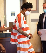 Sheriff's deputies bring Tianna Robinson, then 25, into court in May 2021.
Mandatory Credit:	Liz Dufour/The Enquirer/USA Today Network via CNN Newsource
Dateline:	Not available