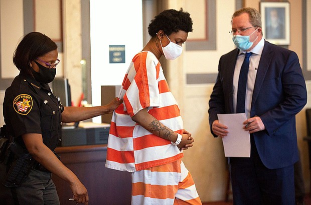 Sheriff's deputies bring Tianna Robinson, then 25, into court in May 2021.
Mandatory Credit:	Liz Dufour/The Enquirer/USA Today Network via CNN Newsource
Dateline:	Not available