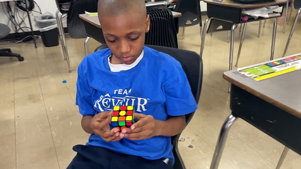 Tarron Nelson can complete a Rubik’s Cube in less than 2 minutes with a record time of 43 seconds.
Mandatory Credit: