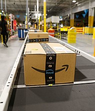 S&P Dow Jones Indices, which manages the Dow Jones Industrial Average, said it planned to add Amazon to the index to reflect "the evolving nature of the American economy."
Mandatory Credit:	Octavio Jones/Getty Images via CNN Newsource