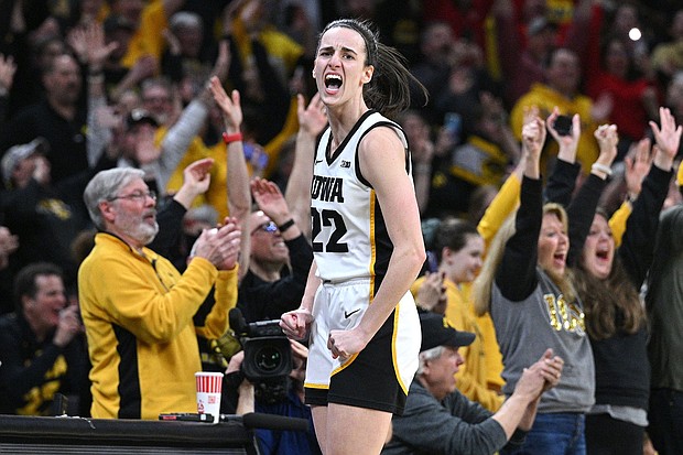 Clark celebrates after becoming women's college basketball's leading scorer.
Mandatory Credit:	Jeffrey Becker/USA TODAY Sports/Reuters via CNN Newsource