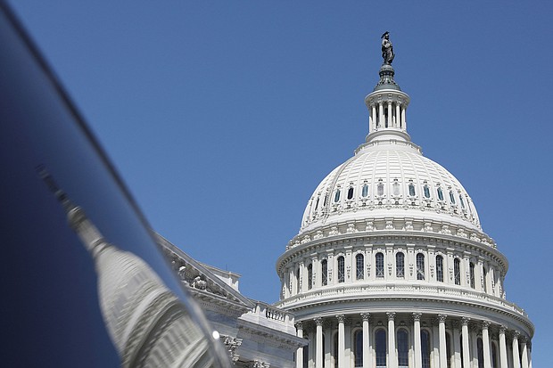 The dome of the US Capitol is reflected in a window on Capitol Hill in Washington, DC, on April 20, 2023.
Mandatory Credit:	Amanda Andrade-Rhoades/Reuters via CNN Newsource