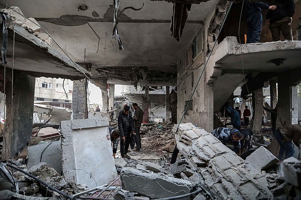 People inspect damage to their homes following Israeli air strikes on February 24, in Rafah, Gaza.
Mandatory Credit:	Ahmad Hasaballah/Getty Images via CNN Newsource