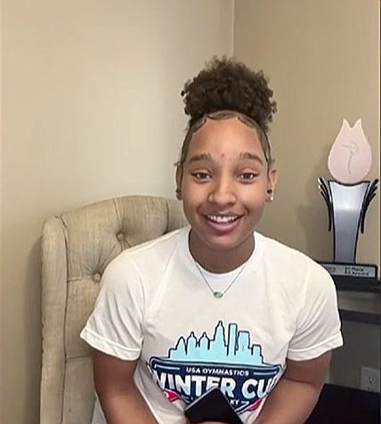 One day before making her debut in the Winter Cup, 16-year-old CaMarah Williams got the surprise of a lifetime when Simone Biles acknowledged one of her routines.
Mandatory Credit:	KCTV via CNN Newsource