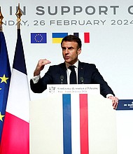 French President Emmanuel Macron floats sending Western troops to Ukraine, and he is seen here, speaking at a news conference at the end of the conference on Monday.
Mandatory Credit:	Gonzalo Fuentes/Reuters via CNN Newsource