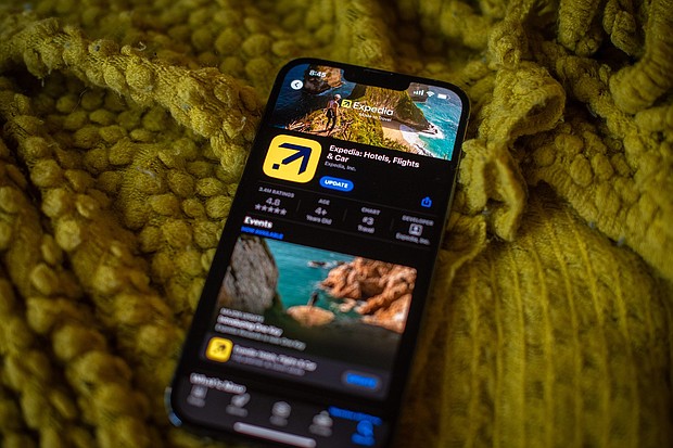 Expedia is laying off thousands of employees.
Mandatory Credit:	Tiffany Hagler-Geard/Bloomberg/Getty Images via CNN Newsource