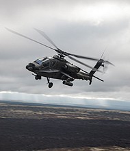 File photo from the US Marine Corps showing a US Army AH-64 Apache attack helicopter at Pohakuloa Training Area in Hawaii on February 1.
Mandatory Credit:	Sgt. Grace Gerlach/US Marine Corps via CNN Newsource