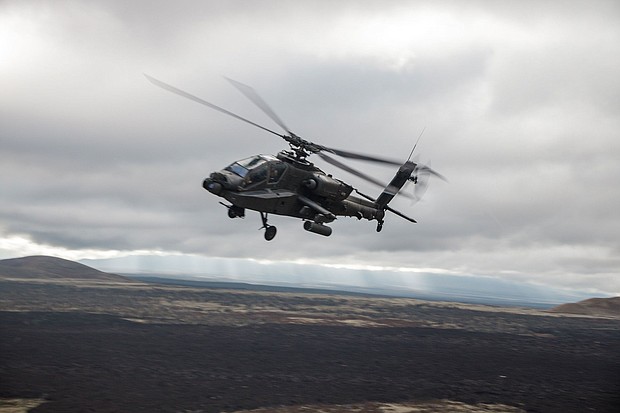 File photo from the US Marine Corps showing a US Army AH-64 Apache attack helicopter at Pohakuloa Training Area in Hawaii on February 1.
Mandatory Credit:	Sgt. Grace Gerlach/US Marine Corps via CNN Newsource