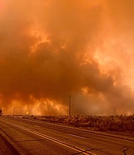 A wildfire burns northwest of Canadian, Texas, on Tuesday, February 27.
Mandatory Credit:	Courtesy Miguel Lira/Booker Grocery Cafe & Catering via CNN Newsource